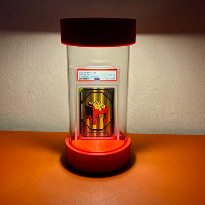 Graded card display stand with puck light and acrylic tube