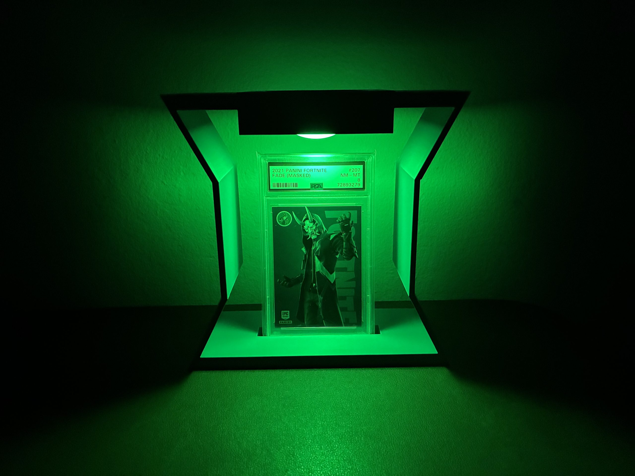 Hourglass graded card holder with green puck light