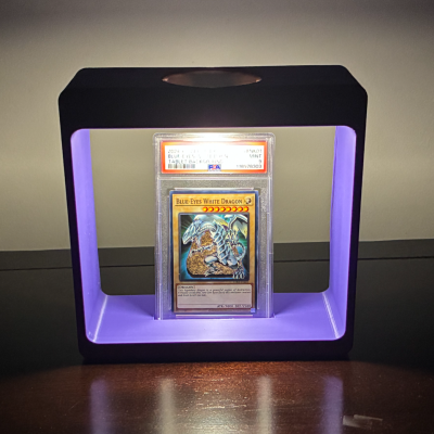 PSA graded card stand with color-changing puck light