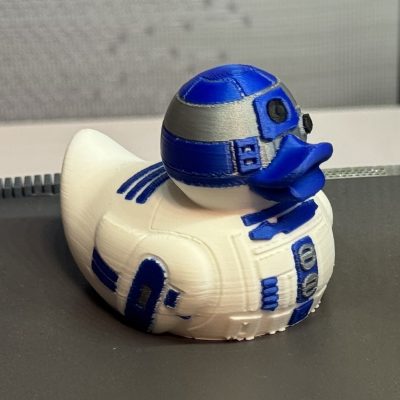 Blue-and-white astromech droid collectible duck