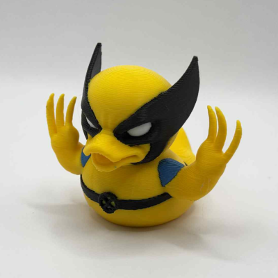Yellow-and-blue clawed superhero-style collectible duck